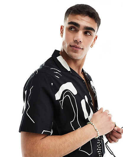 Relaxed revere shirt with line drawing abstract print in black